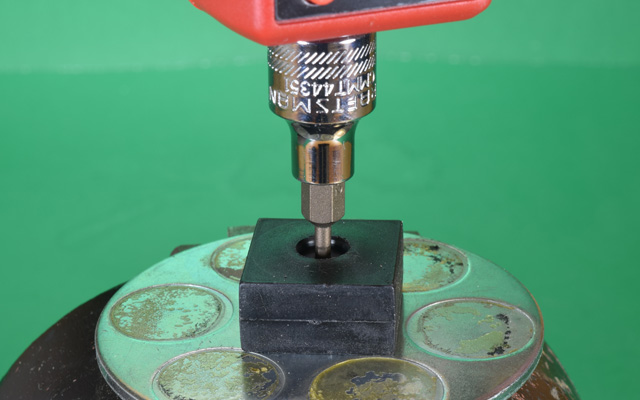 Tightening screw into plastic magnet