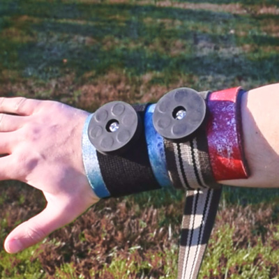 Magnets on wrist wrap to hold magnetic props