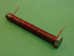 Bolt wrapped in magnet wire