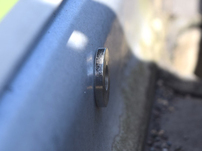 Ring magnet on inside of aluminum gutter to support hook magnet