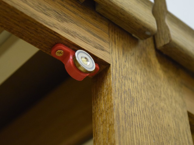 Countersunk magnet installed under cabinet