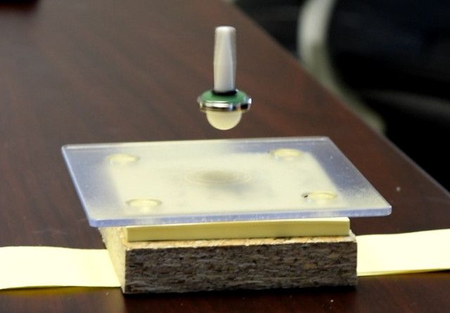 Top levitating with magnet