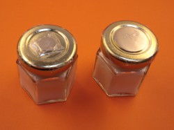 Magnets on spice jar lids
