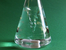 Magnetic stir bar spinning water in a beaker