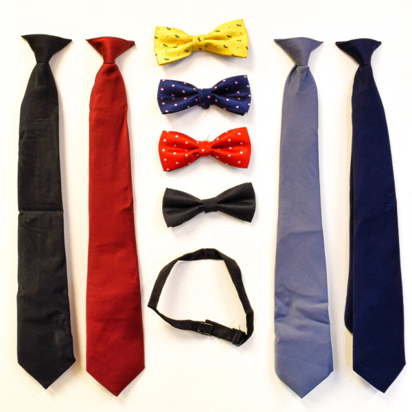 Assortment of colorful ties and bowties