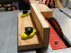Magnet switches on table saw jig