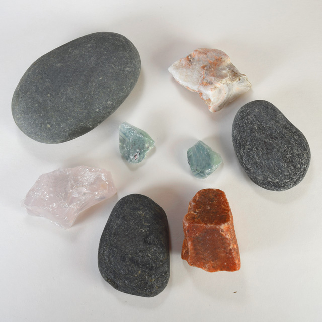 Rocks and minerals hanging on fridge with magnets