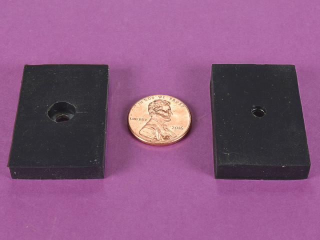 Rubber mounting magnets next to penny