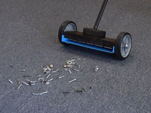 Magnetic sweeper picking of metal debris and hardware from floor