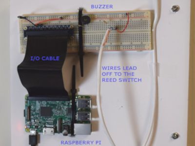 Alarm system using magnets and raspberry pi processor