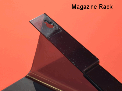 Disc magnet taped on magazine rack