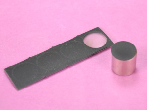 Adhesive traction pads to prevent magnets from slipping