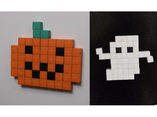 Plastic magnets used to make halloween pumpkin and ghost fridge magnet decorations